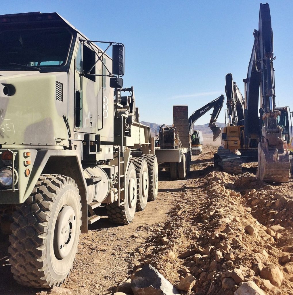 military transport and excavators